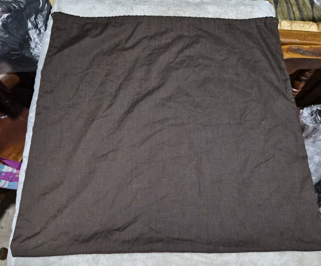 Couronne Brown Dust Bag (Category: Baby Monitors) located in Mandaue City. Submitted by chuchi152615 (Listing ID 1462791423, Image 2). Description: Brown dust bag from Couronne. Has the brand name printed in light green. Measures approximately 20 inches by 20 inches. Good for storing handbags or other accessories. Keep your items protected..