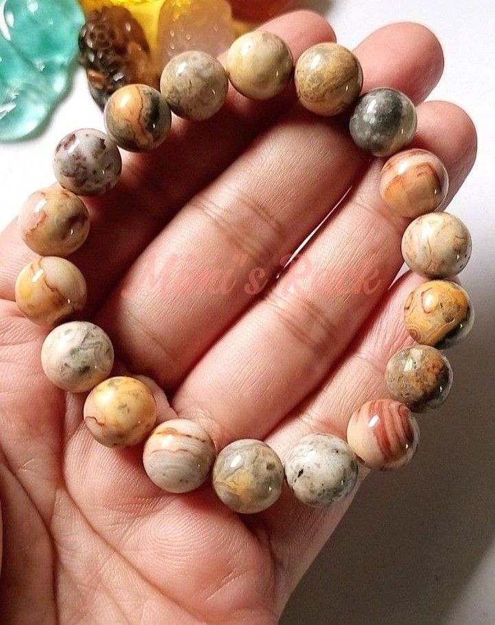 CRAZY LACE AGATE NATURAL STONE BRACELET (Category: Bracelets) located in Taguig. Submitted by mimisrack (Listing ID 1462689330, Image 2). Description: 🧡Joyful, uplifting stone known as the "laughter stone" for positivity and emotional balance -Crazy Lace Agate is known for boosting joy, optimism, and light-hearted energy -Unique swirling patterns symbolize movement, growth, and life flow -Helps ease emotional stress and promotes inner balance -E