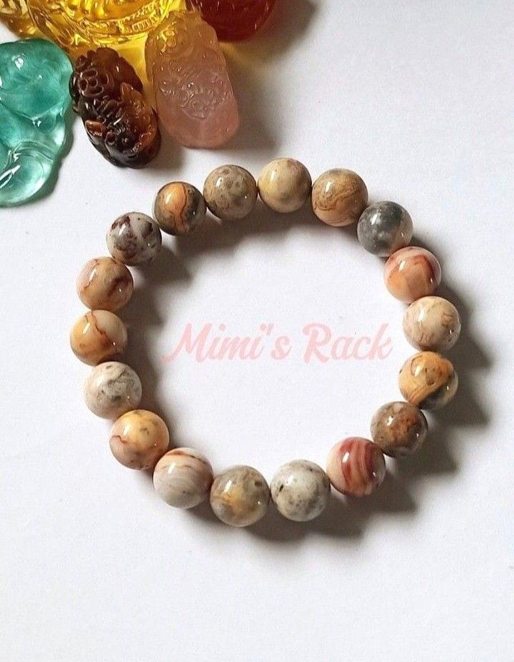 CRAZY LACE AGATE NATURAL STONE BRACELET (Category: Bracelets) located in Taguig. Submitted by mimisrack (Listing ID 1462689330, Image 3). Description: 🧡Joyful, uplifting stone known as the "laughter stone" for positivity and emotional balance -Crazy Lace Agate is known for boosting joy, optimism, and light-hearted energy -Unique swirling patterns symbolize movement, growth, and life flow -Helps ease emotional stress and promotes inner balance -E