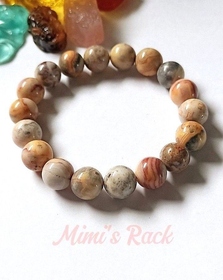 CRAZY LACE AGATE NATURAL STONE BRACELET (Category: Bracelets) located in Taguig. Submitted by mimisrack (Listing ID 1462689330, Image 1). Description: 🧡Joyful, uplifting stone known as the "laughter stone" for positivity and emotional balance -Crazy Lace Agate is known for boosting joy, optimism, and light-hearted energy -Unique swirling patterns symbolize movement, growth, and life flow -Helps ease emotional stress and promotes inner balance -E