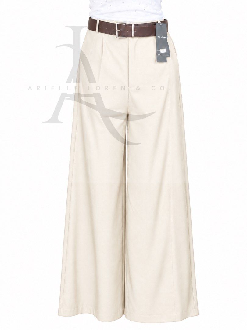 CREAM - WIDE LEG PANTS (Category: Jeans) located in Manila. Submitted by ariellelorenco (Listing ID 1462884662, Image 1). Description: 👉🏻Color: Cream 👉🏻39 in length 👉🏻12 in width (hem/laylayan) 👉🏻With free belt 👉🏻With 2 side pockets 👉🏻38 in max (waistline/garterized) ***These are all actual photos ***Color may vary due to lighting .