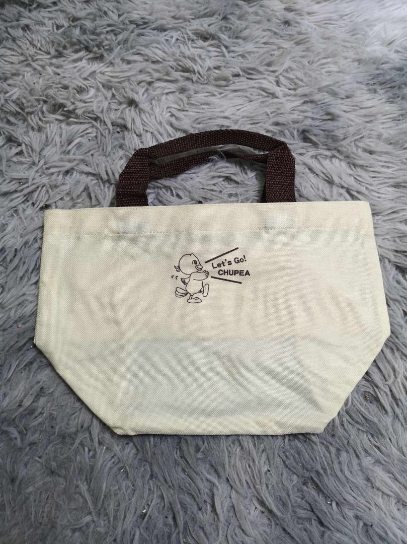 Cream Canvas Mini Tote bag With Brown Handle (Category: Tote Bags) located in Santa Cruz. Submitted by jmy_surplus.2 (Listing ID 1462686207, Image 1). Description: Size ; L- 7.4 W - 11 Color ; Cream Type ; Tote Bag Brand ; No brand Material ; Canvas Style ; Cream Mini Tote bag LR 129 JMY 5 Batch #222.