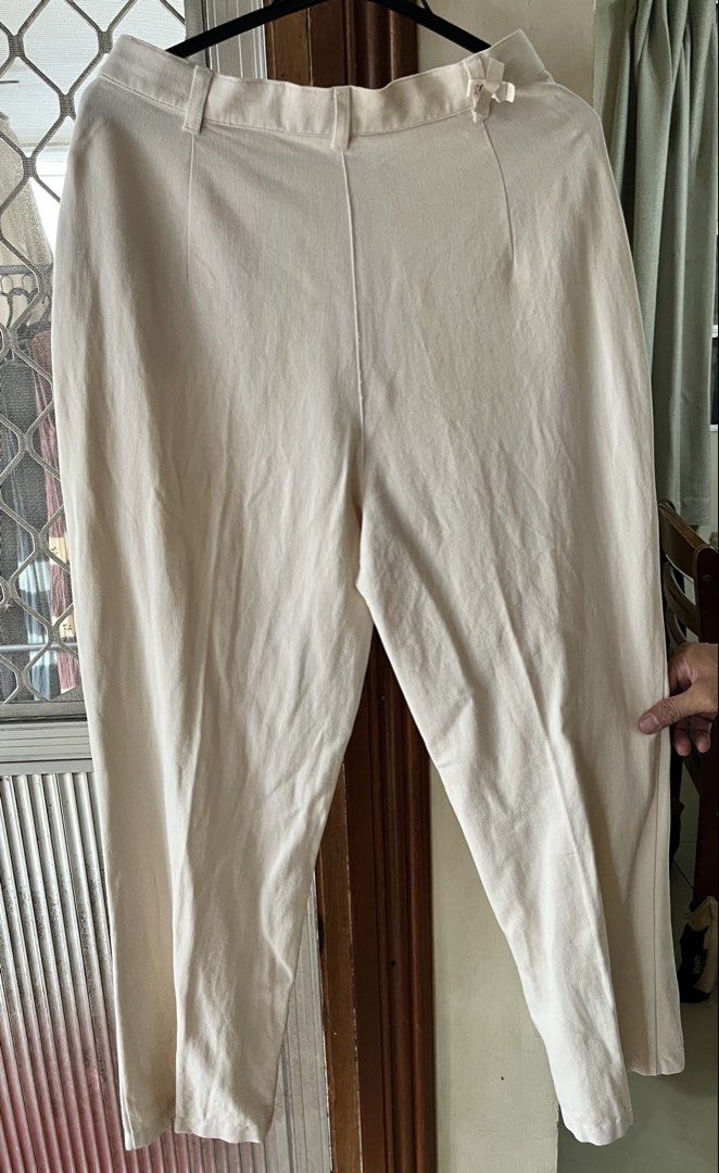 Cream Colored Trousers (Category: Other Bottoms) located in Bacoor. Submitted by ayit. (Listing ID 1462746506, Image 2). Description: - Cream colored trousers - Classic fit with belt loops - Button and zip closure - Two side pockets and two back pockets - Perfect for casual or smart casual outfits.