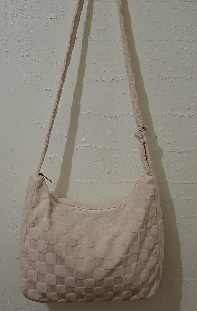 Cream crossbody bag (Category: Cross-body Bags) located in Caloocan City. Submitted by pvaliao (Listing ID 1462841237, Image 1). Description: A soft, large capacity cream colored cotton or textured fabric hobo and shoulder bag with adjustable strap. It can be a crossbody bag. Pre-owned Size: 15 inches × 11 inches Buy it now 😊 100 pesos only.