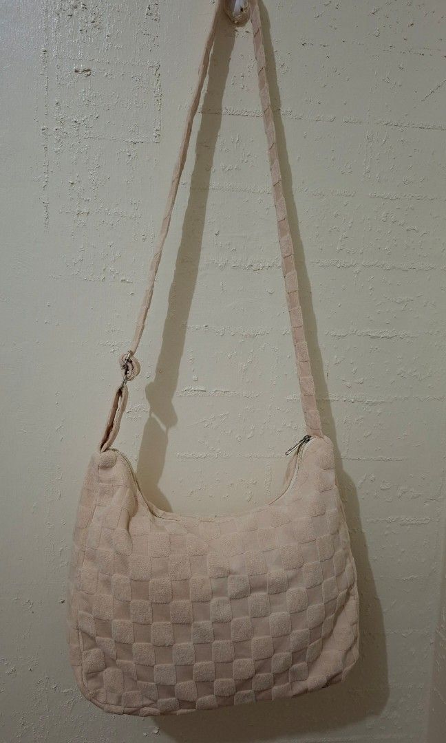 Cream crossbody bag (Category: Cross-body Bags) located in Caloocan City. Submitted by pvaliao (Listing ID 1462841237, Image 2). Description: A soft, large capacity cream colored cotton or textured fabric hobo and shoulder bag with adjustable strap. It can be a crossbody bag. Pre-owned Size: 15 inches × 11 inches Buy it now 😊 100 pesos only.
