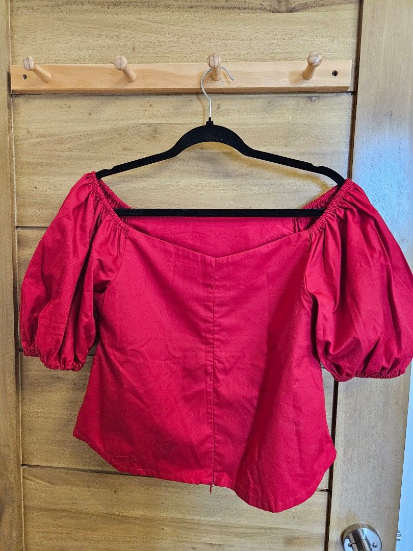 CRISP Red Off-Shoulder Puff Sleeve Top Size M (Category: Blouses) located in Taguig. Submitted by specialthings007 (Listing ID 1462723734, Image 2). Description: - Red off-shoulder top - Features puff sleeves - Elasticated neckline and cuffs for a comfortable fit - very good quality material - Estimated size M - Fits less than 98cm chest.