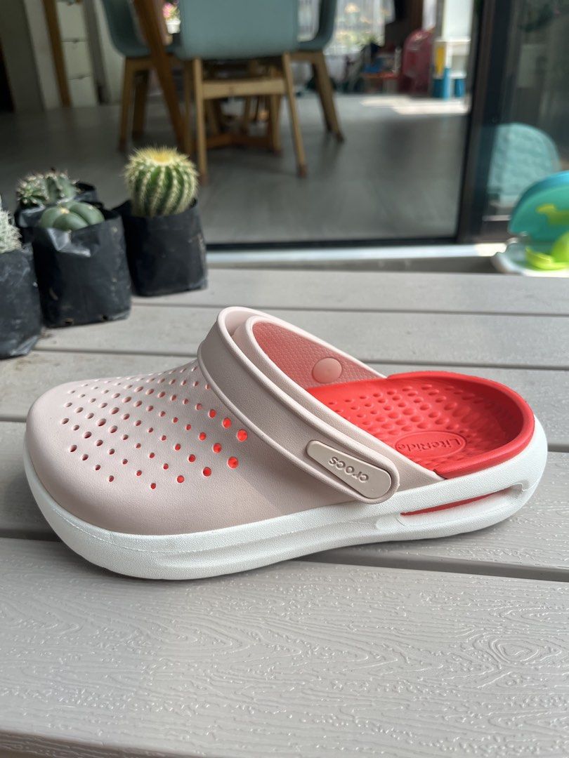 Crocs LiteRide Clogs Pink White Coral (Category: Slippers and slides) located in Cebu City. Submitted by cloystercarillo (Listing ID 1462774019, Image 3). Description: - size 6 (womeb) - used only once, bought march 2026 - Super comfy Crocs LiteRide clogs - Pink exterior with bright coral interior - White sole - Easy to slip on and off - Lightweight and breathable design - Ideal for everyday wear or travel.