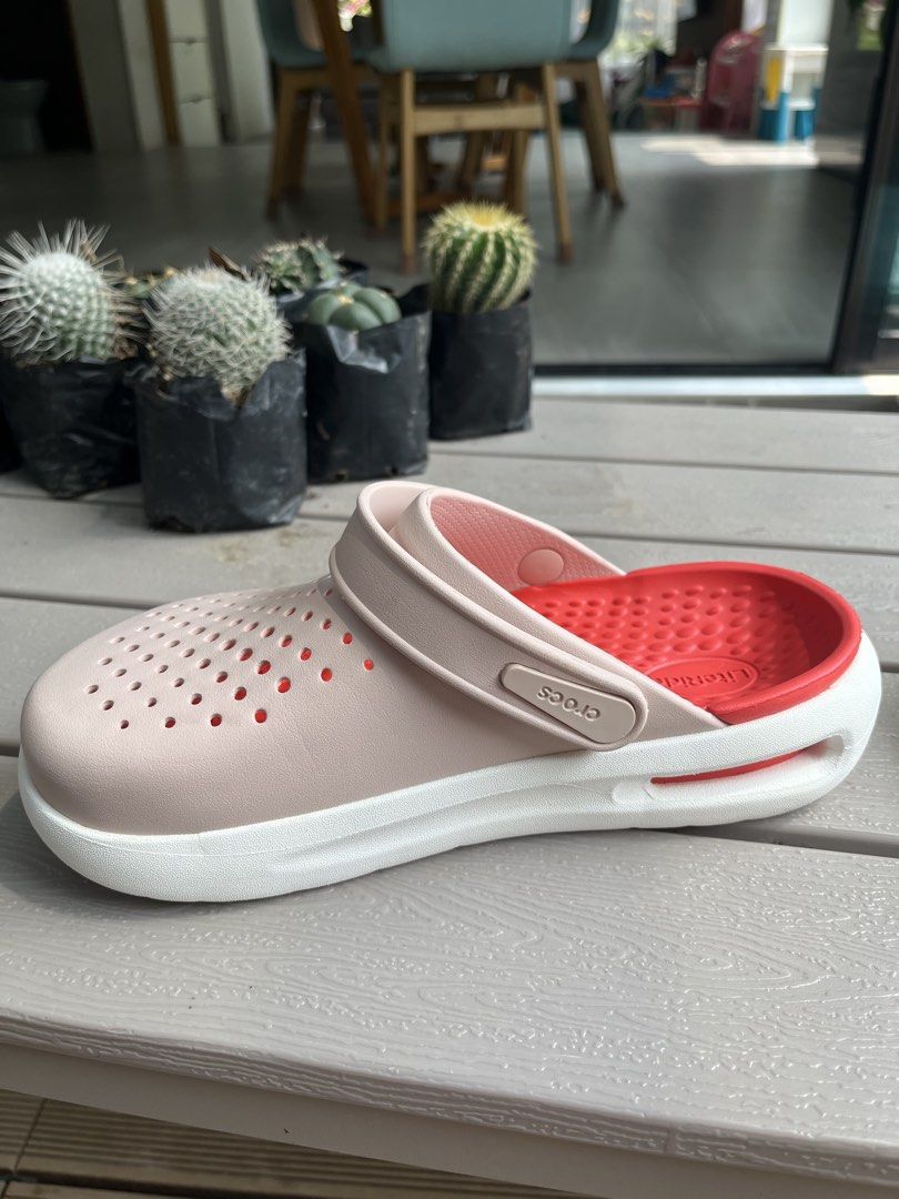 Crocs LiteRide Clogs Pink White Coral (Category: Slippers and slides) located in Cebu City. Submitted by cloystercarillo (Listing ID 1462774019, Image 2). Description: - size 6 (womeb) - used only once, bought march 2026 - Super comfy Crocs LiteRide clogs - Pink exterior with bright coral interior - White sole - Easy to slip on and off - Lightweight and breathable design - Ideal for everyday wear or travel.