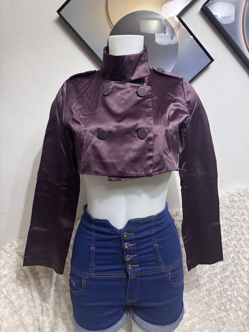 Cropped Double-Breasted Satin Jacket (Category: Coats, Jackets and Outerwear) located in Marikina City. Submitted by lorradel (Listing ID 1462731951, Image 2). Description: - fits S-M - Dark purple cropped jacket - Shiny satin material - Double-breasted button closure - Stand-up collar - Shoulder details - Long sleeves - Ideal for pairing with high-waisted bottoms - MAY HAVE some washable stains (hindi maiiwasan) needs washing; had been stored - 