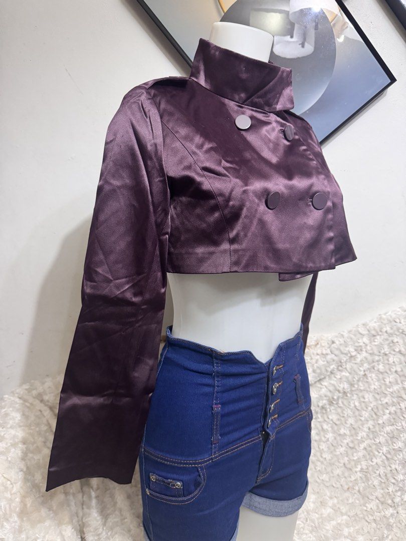 Cropped Double-Breasted Satin Jacket (Category: Coats, Jackets and Outerwear) located in Marikina City. Submitted by lorradel (Listing ID 1462731951, Image 3). Description: - fits S-M - Dark purple cropped jacket - Shiny satin material - Double-breasted button closure - Stand-up collar - Shoulder details - Long sleeves - Ideal for pairing with high-waisted bottoms - MAY HAVE some washable stains (hindi maiiwasan) needs washing; had been stored - 