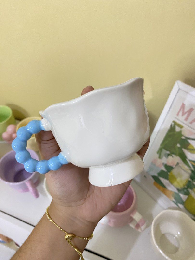 CUTE BEAR MUG BLUE HANDLE (Category: Coffee & Tea Tableware) located in Dasmarinas. Submitted by hannah.oakph (Listing ID 1462766565, Image 3). Description: paint issues only.