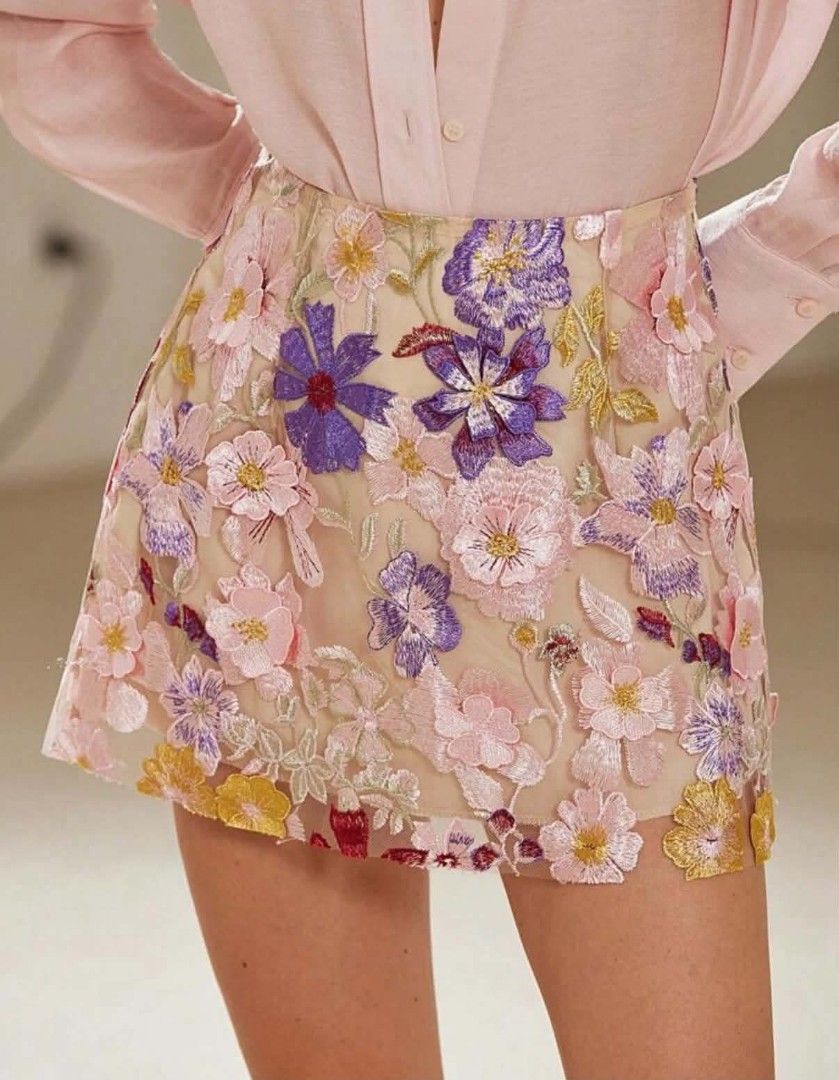 Cute Floral Mini Skirt (Category: Skirts) located in Paranaque City. Submitted by lizzyscloset01 (Listing ID 1462793920, Image 2). Description: - Sheer mesh mini skirt - Beautiful floral embroidery with colorful flowers all over - Beige base color - Versatile styling: looks great with a blouse - Ideal for special occasions or a night out - Unique piece.