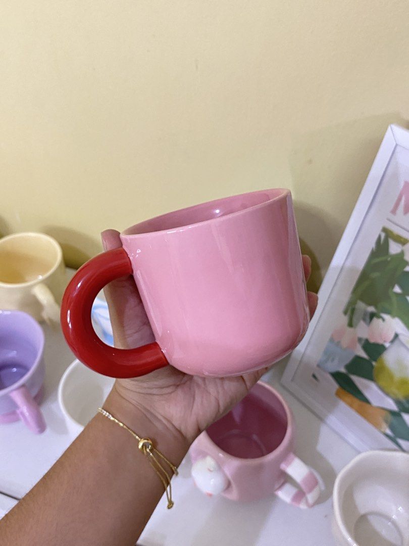 CUTE PINK MUG WITH RED HANDLE (Category: Coffee & Tea Tableware) located in Dasmarinas. Submitted by hannah.oakph (Listing ID 1462768090, Image 3). Description: .