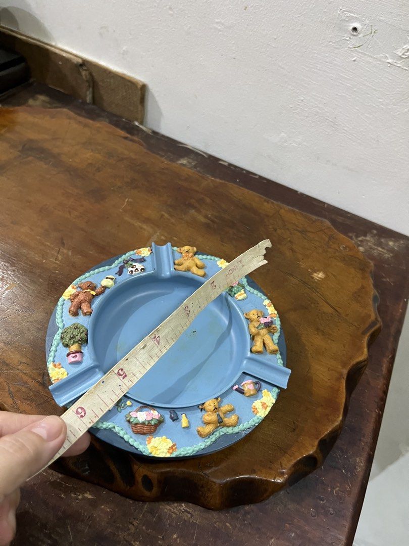 Cute Teddy Bear Ashtray Blue (Category: Other Home Decor) located in Taguig. Submitted by minmin_parker (Listing ID 1462834950, Image 3). Description: - Adorable blue ashtray featuring charming teddy bear designs. - Decorated with little bears, flowers, and a basket motif. - Perfect for collectors or as a unique decorative item. - Shows minor marks inside the tray..