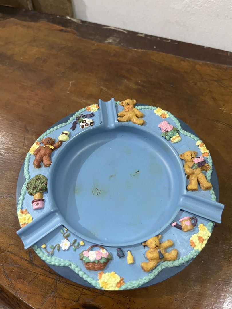 Cute Teddy Bear Ashtray Blue (Category: Other Home Decor) located in Taguig. Submitted by minmin_parker (Listing ID 1462834950, Image 2). Description: - Adorable blue ashtray featuring charming teddy bear designs. - Decorated with little bears, flowers, and a basket motif. - Perfect for collectors or as a unique decorative item. - Shows minor marks inside the tray..