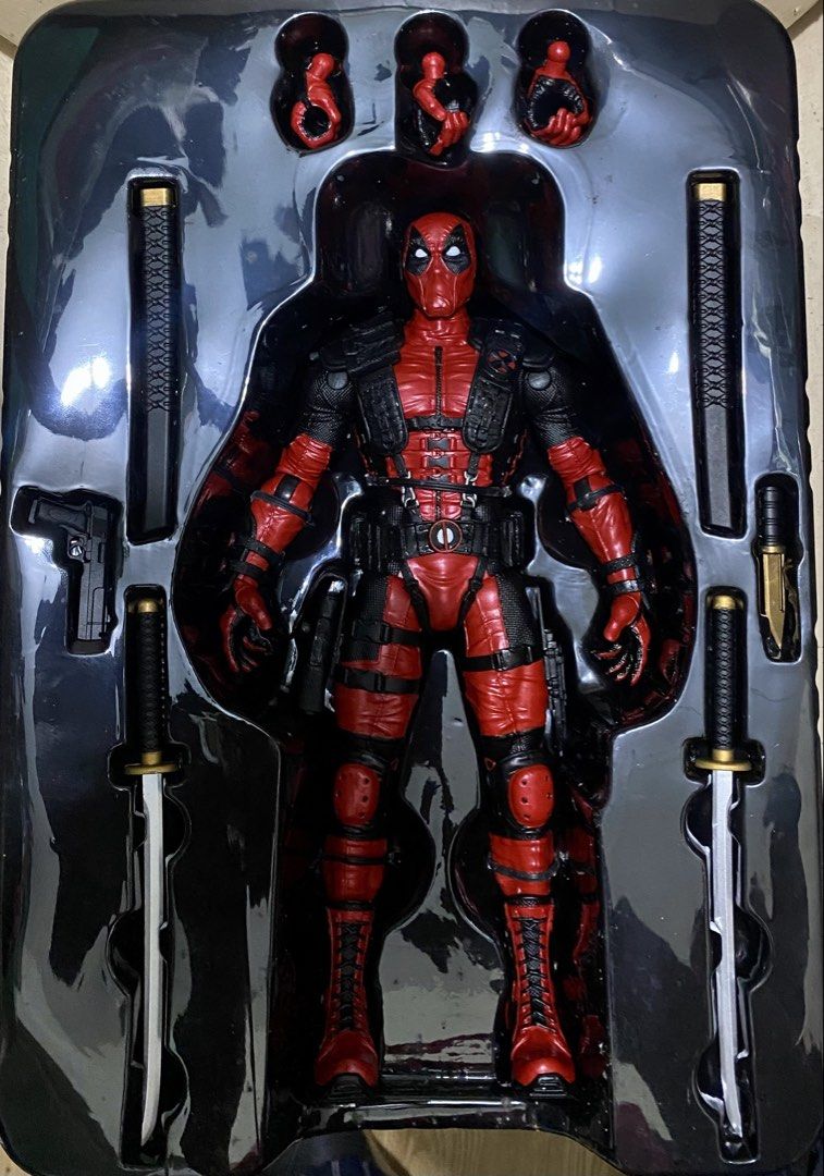 Deadpool 1:6 Scale (Category: Figurines & Statues) located in Manila. Submitted by ariane0422 (Listing ID 1462776426, Image 1). Description: - Detailed Deadpool action figure - Includes multiple accessories: swords, gun, extra hands - All items in original packaging - A must-have for any Marvel fan!.