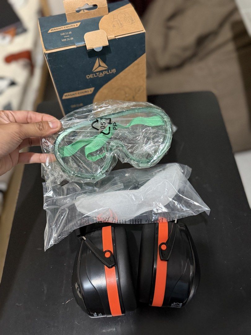 Deltaplus Hearing Protection Earmuffs and Goggles Set (Category: Headphones & Headsets) located in Caloocan City. Submitted by rohllee (Listing ID 1462721940, Image 3). Description: - Deltaplus Hearing Protection Set - Includes earmuffs and safety goggles - Earmuffs: Black & orange with padded headband for comfort - Goggles: Clear lenses with green accents for visibility - Ideal for noisy environments - Comes in original packaging - Unused.