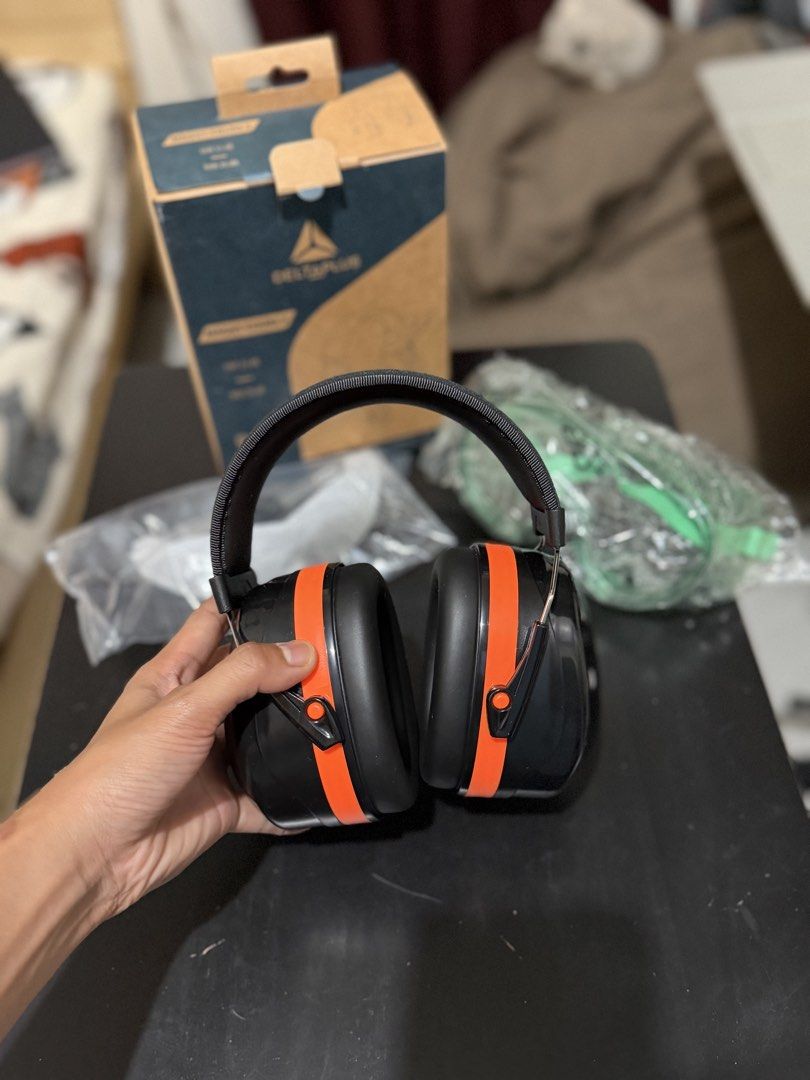 Deltaplus Hearing Protection Earmuffs and Goggles Set (Category: Headphones & Headsets) located in Caloocan City. Submitted by rohllee (Listing ID 1462721940, Image 2). Description: - Deltaplus Hearing Protection Set - Includes earmuffs and safety goggles - Earmuffs: Black & orange with padded headband for comfort - Goggles: Clear lenses with green accents for visibility - Ideal for noisy environments - Comes in original packaging - Unused.