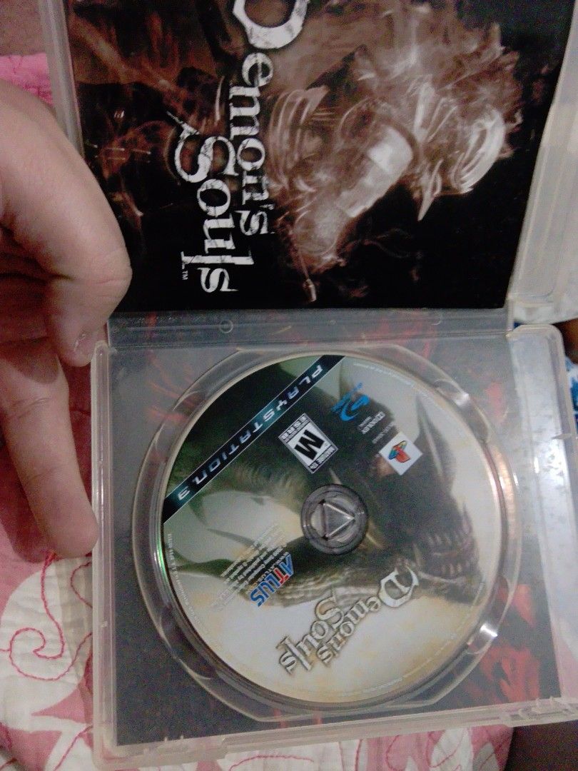 Demon's Souls PS3 Game (Category: PlayStation) located in Caloocan City. Submitted by grannysgames (Listing ID 1462763266, Image 2). Description: - Demon's Souls for PlayStation 3 - Rated M for Mature - Includes original case and disc - Case has minor scuffs but is fully functional - Classic action RPG.