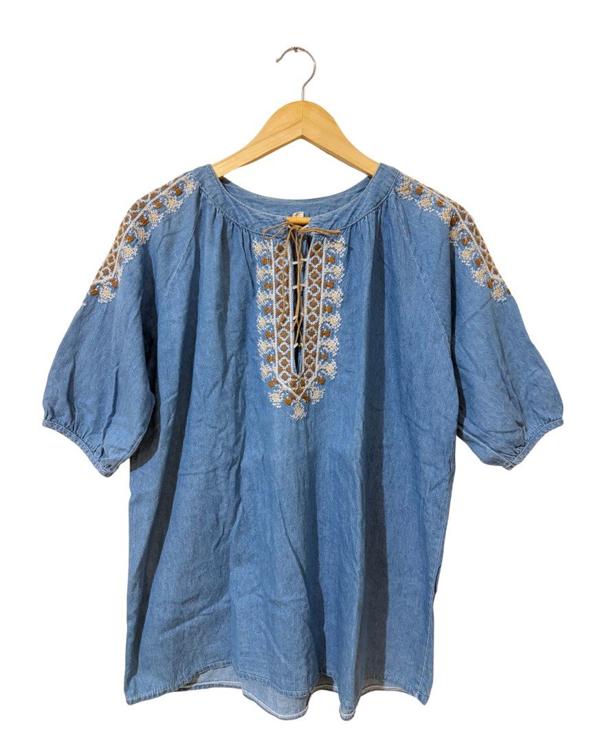 Denim Embroidered Tunic Top with Tie Neck (Category: Blouses) located in Subic. Submitted by ciesells (Listing ID 1462861224, Image 1). Description: bust: 48 (large-XL) sleeve: 15 inches - Suede leather ribbon - Denim - Intricate embroidery on yoke and sleeves - Ideal for a casual boho look.