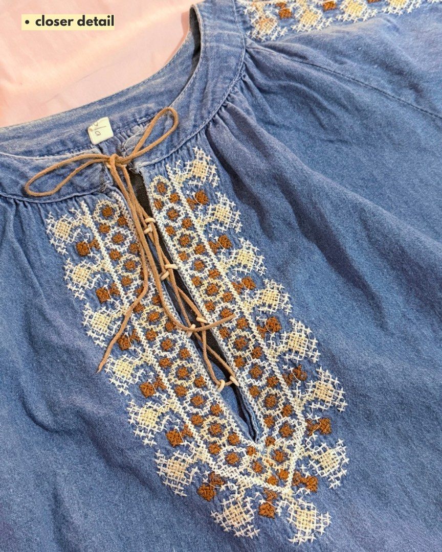 Denim Embroidered Tunic Top with Tie Neck (Category: Blouses) located in Subic. Submitted by ciesells (Listing ID 1462861224, Image 2). Description: bust: 48 (large-XL) sleeve: 15 inches - Suede leather ribbon - Denim - Intricate embroidery on yoke and sleeves - Ideal for a casual boho look.