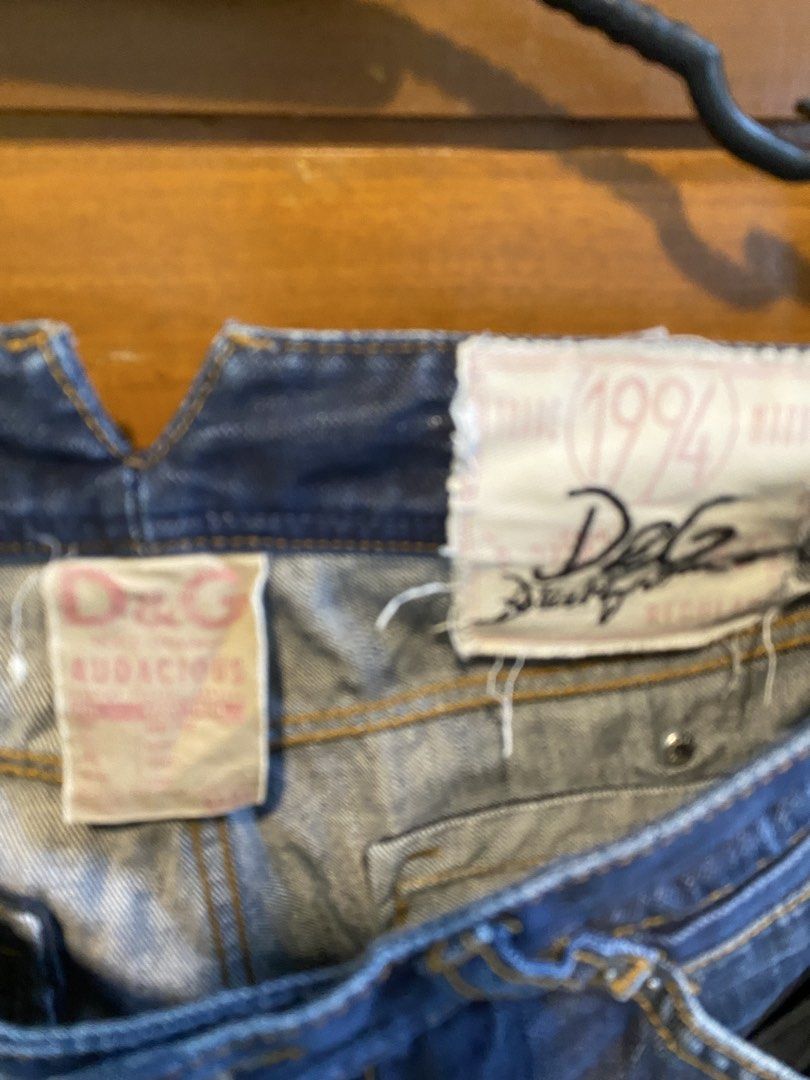 D&G Audacious Denim Jeans (Category: Jeans) located in Manila. Submitted by pureearth_866d1c (Listing ID 1462697413, Image 3). Description: - Authentic Dolce & Gabbana (D&G) Jeans - Style Name: Audacious - Dark Wash Denim - Features '1994' Tag - Button Fly Closure - Two Back Pockets with Flap and Button Closure - Unique Stitching Details - Size: Medium (M) - A great pair of statement jeans!.