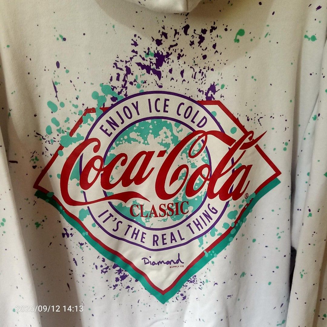 Diamond x Coca -Cola (Category: Hoodies) located in Manila. Submitted by yaaaaaj- (Listing ID 1462717508, Image 2). Description: Diamond x Coca Cola Pullover Hoodie Jacket / Paint Splattered Design Good as New Made in Pakistan Size XLarge (L29" x W25") Sleeves Length : 27" Ribbings : 9" No Issues 2k freeship ( negotiable).
