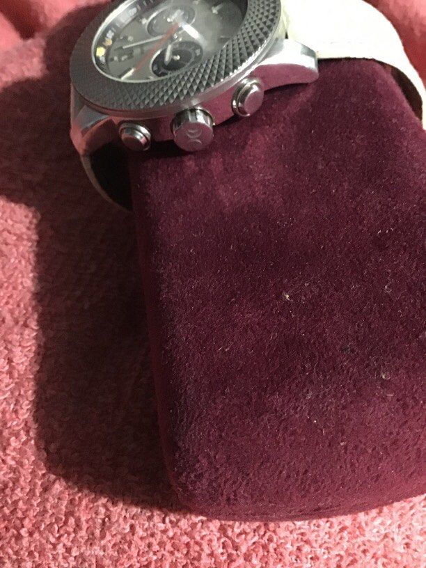 DICI MILANO Quartz authentic (Category: Men's Watches) located in Baguio. Submitted by agozun61 (Listing ID 1462878046, Image 3). Description: DICI Milano chronograph wristwatch featuring silver tone textured bezel and a white leather strap..