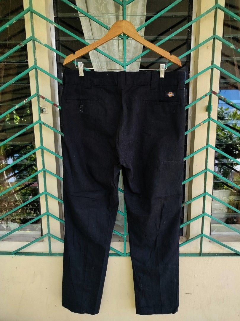 Dickies Slim Taper Black Pants 36x32 (Category: Jeans) located in Manila. Submitted by geraldquinto_917 (Listing ID 1462839637, Image 2). Description: - Dickies Slim Taper Pants - Color: Black - Size: 36x32 - Origin: Made in Honduras - Style: Classic workwear - Material: Durable fabric - Pockets: Two back pockets, one side cargo pocket - Closure: Gold zipper and button - Ideal for: Everyday wear.