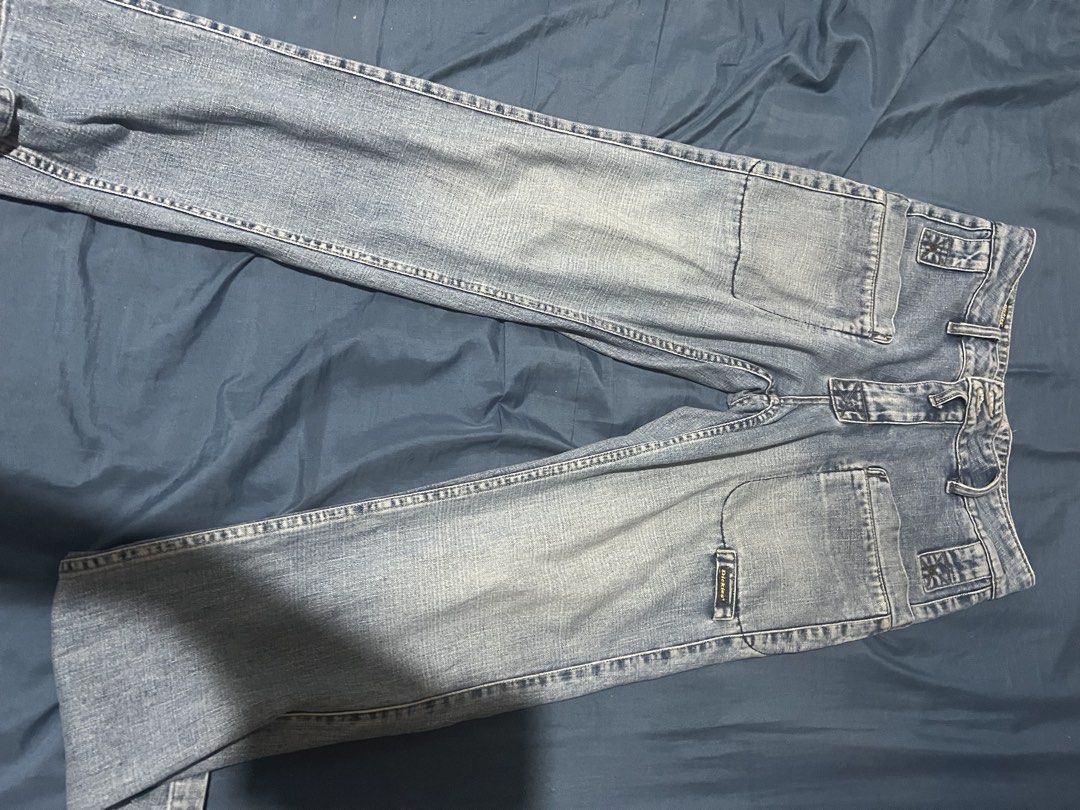 Dickies Workwear Jeans Denim Pants (Category: Jeans) located in Quezon City. Submitted by qwertyyuiopy (Listing ID 1462809675, Image 3). Description: - Classic light wash Dickies denim jeans - Relaxed fit for comfort - Durable construction for everyday wear or work - Features multiple pockets - Iconic Dickies logo patch - 'Work Underground' tag indicating a unique style or collaboration.