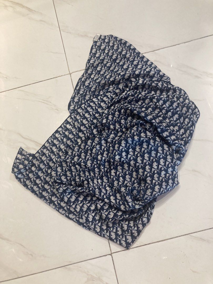 Dior Silk Scarf (Category: Scarves) located in Quezon City. Submitted by janisu0303 (Listing ID 1462845451, Image 1). Description: - Christian Dior Silk Scarf Blue Diorissimo Pattern Featuring Hand-Rolled Edges - 100% Pure Silk - 12,500 php - Made in Italy - Iconic Diorissimo monogram pattern - Color: Navy blue and white - Size: Approx. 50cm x 50cm - Care: Dry clean only - Perfect accessory for a touch of luxury Fairview Area meetups Or shipping 