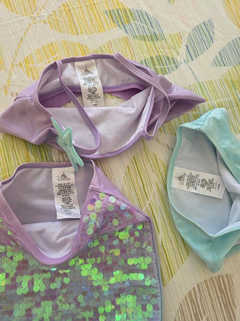 Disney Mermaid Sequin Swimsuit Set (Category: Babies & Kids Fashion) located in Taguig. Submitted by zelynb (Listing ID 1462683944, Image 2). Description: - Cute Disney mermaid swimsuit set - Sparkly purple top with starfish accent - Matching sequined skirt - Light blue bikini bottom included - Perfect for beach or pool adventures - Size: 4 / 104-110cm.