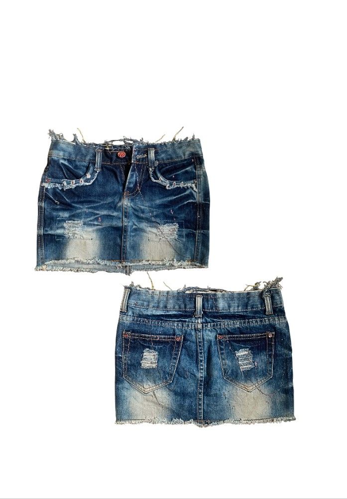 Distressed Denim Mini Skirt & Shorts Set (Category: Sets or Coordinates) located in Tiaong. Submitted by cdoswan (Listing ID 1461561773, Image 1). Description: - Cute distressed denim mini skirt - Matching shorts included - Both items have frayed hems and ripped details - Shorts feature a unique patterned overlay on front pockets - Ideal for a casual, edgy summer style -Waist: 28 inches.