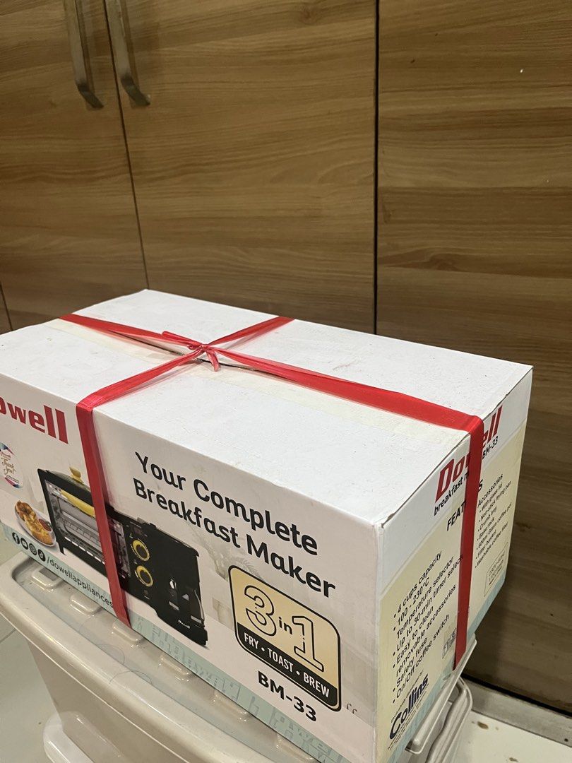 Dowell 3-in-1 Breakfast Maker BM-33 (Category: Ovens & Toasters) located in Manila. Submitted by jericho_chan (Listing ID 1462725401, Image 3). Description: - Dowell BM-33: Your all-in-one breakfast solution! - 3-in-1 functionality: Fry, toast, and brew coffee simultaneously. - Adjustable temperature control up to 230°C. - Convenient 30-minute timer. - Easy to clean with removable accessories. - Dedicated On/Off switch for the coffee maker..