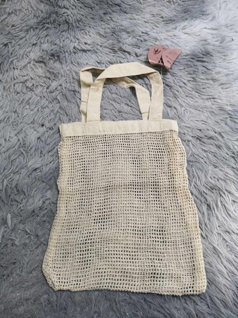 Dual Shoulder Strap Cream Colored Mesh Net Tote Bag (Category: Tote Bags) located in Santa Cruz. Submitted by jmy_surplus.2 (Listing ID 1462789943, Image 1). Description: Size ; L - 11.4 W - 10 Color ; Cream Type ; Tote Bag Brand ; No Brand Material ; Synthetic Style ; Mesh Net Durable Tote bag LR 129 JMY 5 Batch #222.