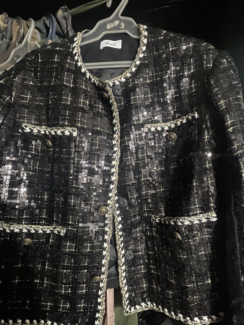Dzzit Black Sequin Tweed Jacket (Category: Coats, Jackets and Outerwear) located in Manila. Submitted by voilacee (Listing ID 1462854309, Image 1). Description: - Dzzit black sequin tweed jacket - Classic collarless design - Button closure - Two front pockets with decorative trim - Versatile for dressing up or adding sparkle.