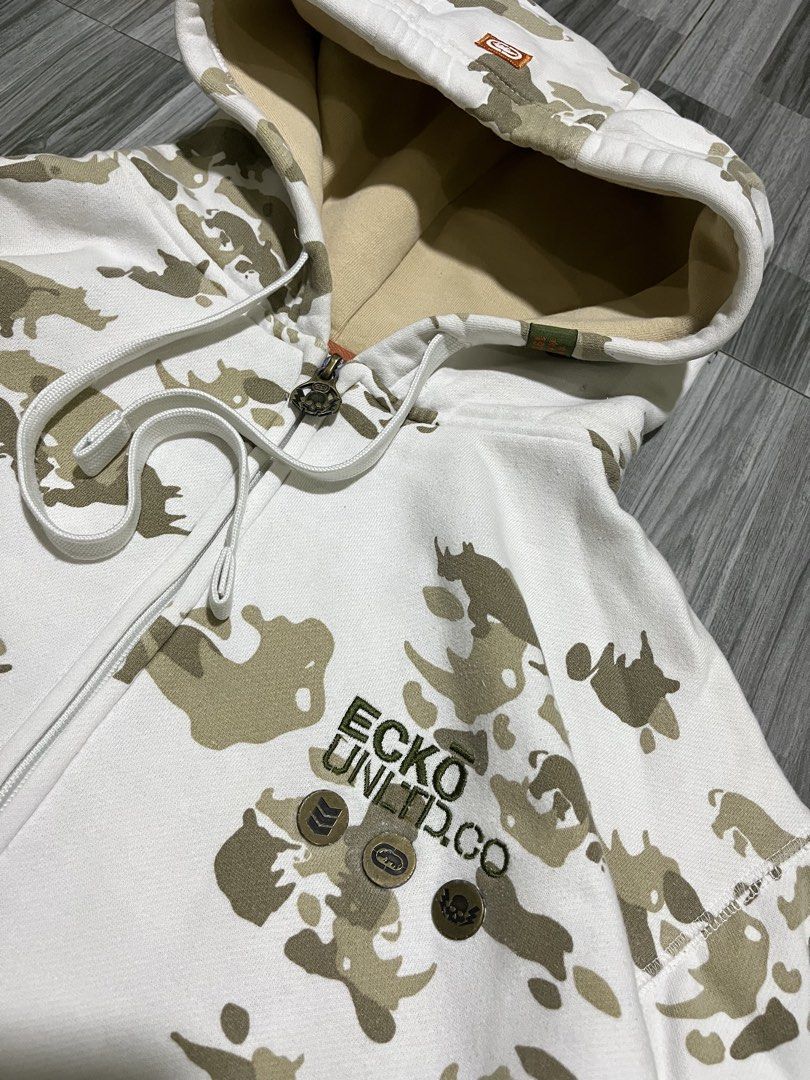 Ecko Unltd. Camo Zip-Up Hoodie (Category: Coats, Jackets and Outerwear) located in Cavite. Submitted by arespichri90266 (Listing ID 1462698787, Image 3). Description: Vintage ECKO UNLTD. CO AOP WITH METAL EMBLEM IN CHEST EXCELLENT CONDITION NO ISSUE 10/10 COLOR RATE DIMES: 24X27 .