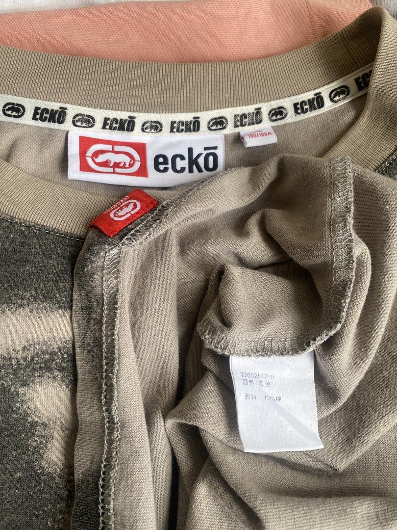 Ecko Unltd. Graphic Spray Paint T-Shirt (Category: Tshirts & Polo Shirts ) located in Manila. Submitted by anthony1723 (Listing ID 1462716094, Image 3). Description: - Brand: Ecko Unltd. - Design: Front spray paint graphic - Sleeves: Checkerboard pattern - Material: 100% Cotton - Tag Size: 180/100A - Occasion: Casual wear.