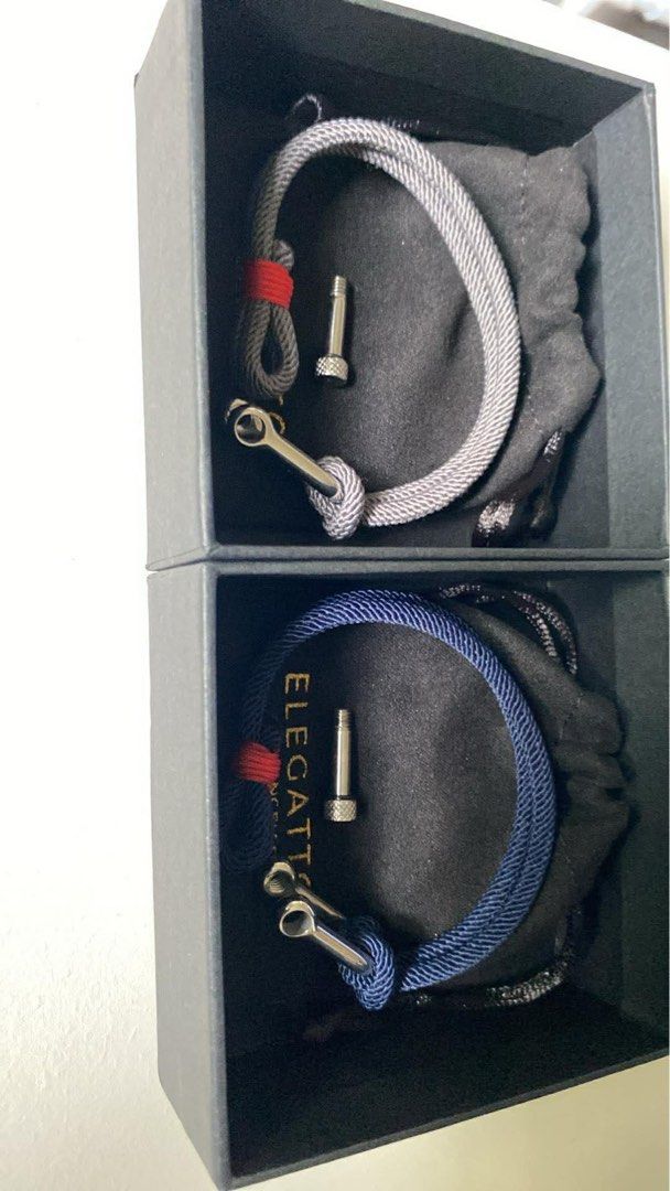 Elegatto Anchor Bundle Bracelets - Navy & Grey (Category: Bracelets) located in Muntinlupa City. Submitted by aidealfind (Listing ID 1462692390, Image 2). Description: - Bundle includes two Elegatto anchor bracelets. - Colors: Navy blue and grey. - Hardware: Silver with a red accent on both. - Style: Ideal for casual, everyday wear. - Size: Small (16.5 cm) - Brand new with box - Sold as a set — yes, it’s 2 pcs .