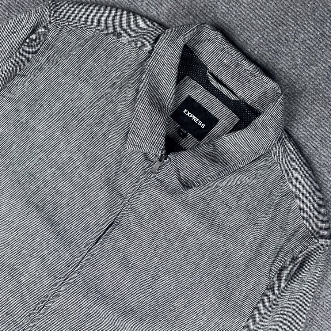 Express Grey Zip-Up Collared Jacket (Category: Coats, Jackets and Outerwear) located in Baguio. Submitted by vintage_lurker (Listing ID 1462856694, Image 2). Description: Size on tag: XL Width: 26” Length: 29” Issue/s: none Mine: 790 + Shipping fee 📍Payment first policy. no COD or COP 📍All items Washed and Sanitized 🧼 Shoot your offer. I’m all ears‼️ OTHER DETAILS: - Express Grey Zip-Up Jacket - Size: XL - Textured fabric - Collared neckline -