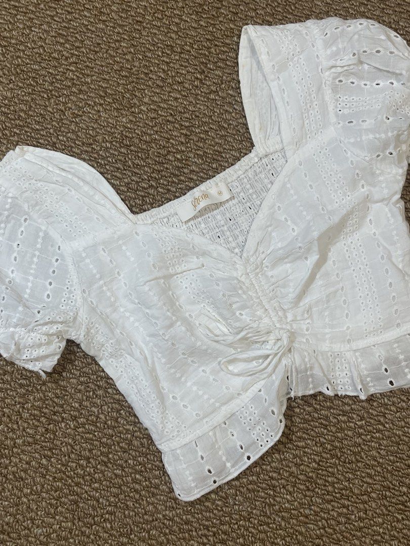 Eyelet Smocked Puff Sleeve Crop Top - M (Category: Blouses) located in Pasig City. Submitted by miafml-closet-cleanout (Listing ID 1462762385, Image 3). Description: - worn around 3x only - marked as medium but it's small! haha posted price is fixed ♡ will not respond to hagglers. 💵 mop: gcash / bdo / maribank / unionbank 🛵 courier: any as long as arranged by buyer 🙅🏻‍♀️ no requested worn photos ❌ no meet-ups.