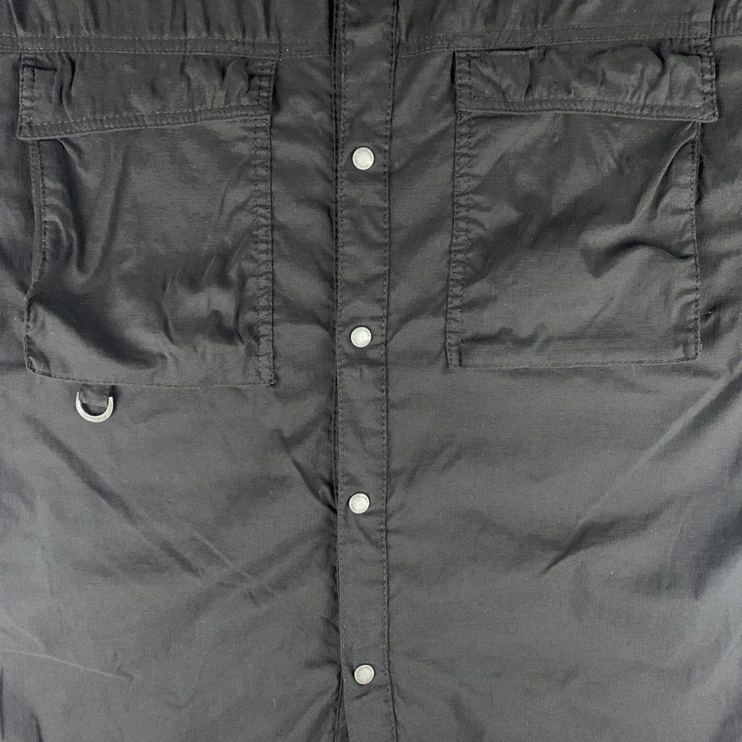 Feild Core Oni-Tex Oversized Utility Button Down Shirt (Category: Tshirts & Polo Shirts ) located in Baguio. Submitted by vintage_lurker (Listing ID 1462860409, Image 3). Description: Size on tag: Large Width: 25” Length: 30” Issue/s: none Mine: 570 + Shipping fee 📍Payment first policy. no COD or COP 📍All items Washed and Sanitized 🧼 Shoot your offer. I’m all ears‼️ OTHER DETAILS: - Black short sleeve button-up shirt - Two chest pockets with b