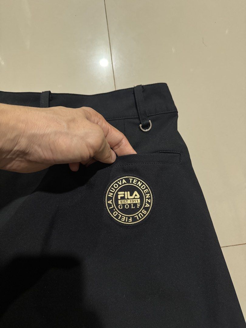 Fila Golf Drifit Skirt Black (Category: Activewear) located in Digos. Submitted by appareall (Listing ID 1462734094, Image 2). Description: AW1-681 Approximate measurements (taken flat in inches) Waist: 28 Length: 14.3 Material: Nylon/ Polyester .