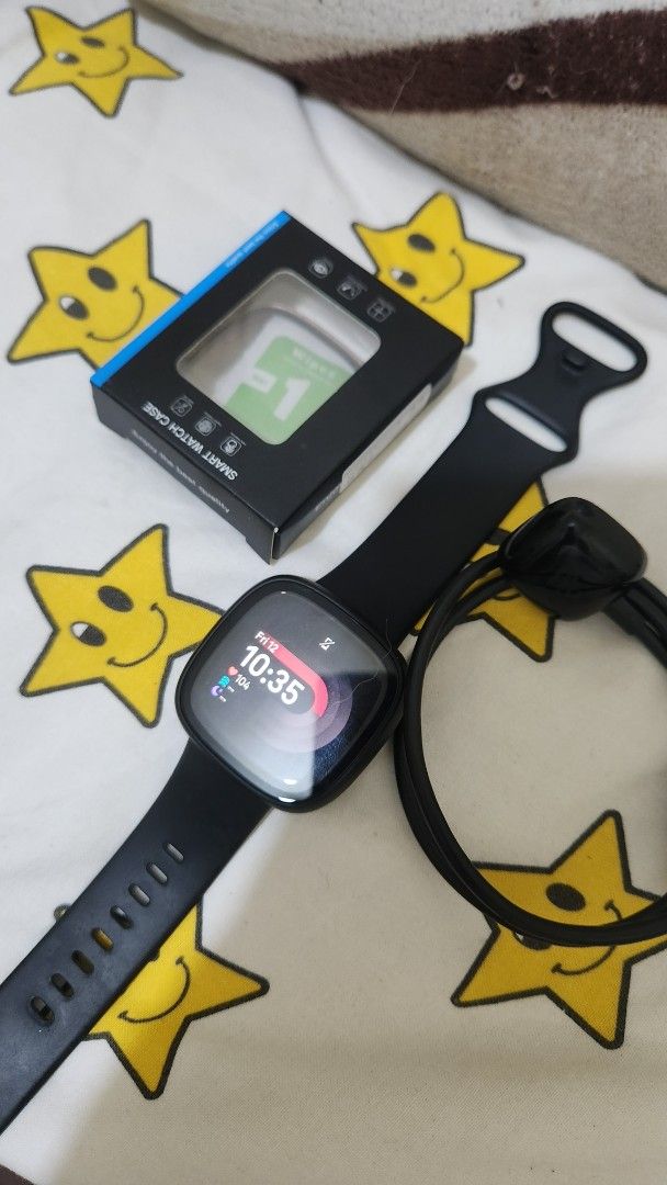 Fitbit versa 4 (Category: Wearables & Smart Watches) located in Quezon City. Submitted by nujazupardo (Listing ID 1462771318, Image 3). Description: - Fitbit Versa 4 Smartwatch (Color: Black) - Original Charger Included - with Smartwatch Case - Screen Protector - new battery - Adjustable Watch Band - Ready for a New Owner -92% overall physical appearance .