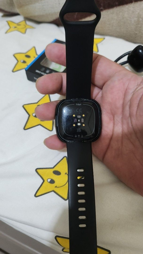 Fitbit versa 4 (Category: Wearables & Smart Watches) located in Quezon City. Submitted by nujazupardo (Listing ID 1462771318, Image 2). Description: - Fitbit Versa 4 Smartwatch (Color: Black) - Original Charger Included - with Smartwatch Case - Screen Protector - new battery - Adjustable Watch Band - Ready for a New Owner -92% overall physical appearance .