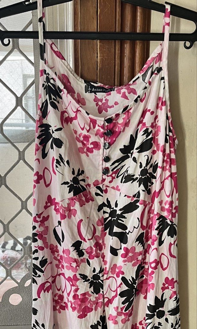 Floral dress (Category: Dresses) located in Bacoor. Submitted by ayit. (Listing ID 1462712661, Image 1). Description: - Chic white midi dress - Eye-catching pink and black floral print - Delicate spaghetti straps - Ideal for summer wear - Great for casual outings and beach days Small-med fit.
