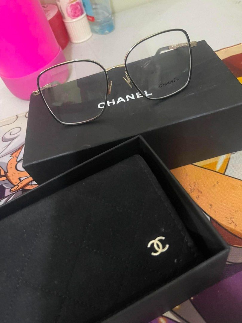For sale Authentic Chanel 2261J Eyeglass Frames (Category: Sunglasses & Eyewear) located in Manila. Submitted by raizel666 (Listing ID 1462861057, Image 1). Description: With box, cleaning cloth, eyeglass case from singapore, no reciept Price nego.
