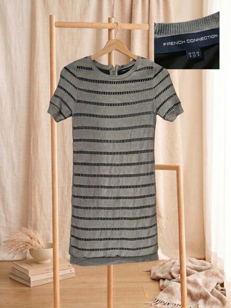 French Connection Grey Striped Knit Mini Dress (Category: Dresses) located in Quezon City. Submitted by yusett (Listing ID 1462747836, Image 2). Description: - French Connection grey knit mini dress - Short sleeves and crew neck - Horizontal stripe pattern - Stylish cut-out details - Comfortable for casual wear - Zipper closure at the back.