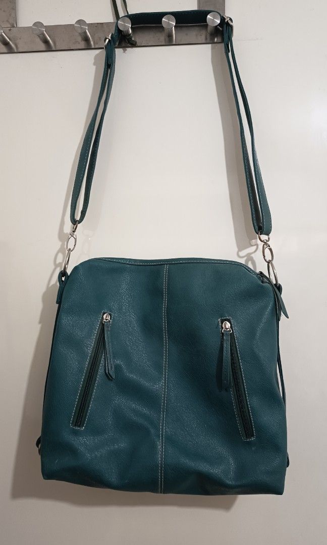 Freude Teal Shoulder Bag (Category: Shoulder Bags) located in Bacoor. Submitted by imshining_23 (Listing ID 1462760164, Image 2). Description: Freude Teal Shoulder Bag/Sling Bag 2 zipper pockets Leather Adjustable strap.