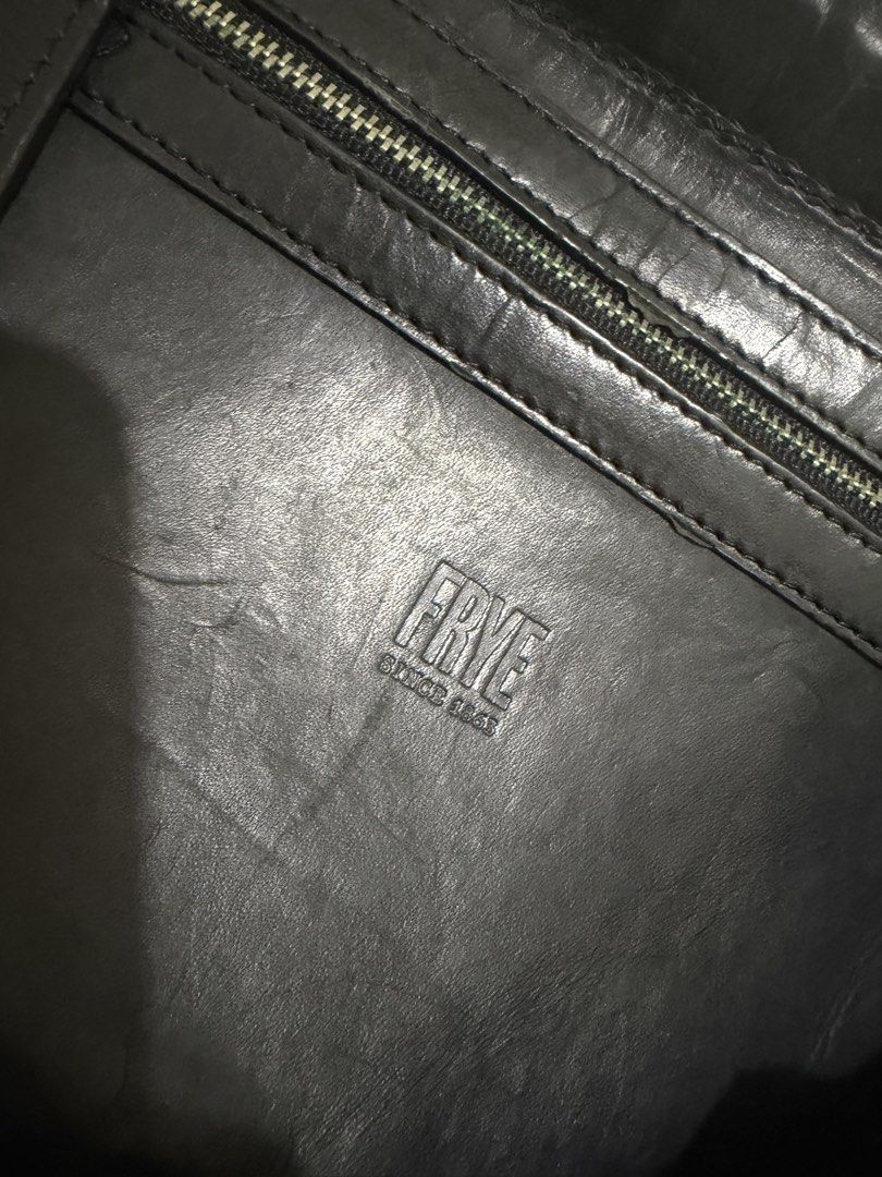 FRYE Black Leather Backpack Since 1863 (Category: Backpacks) located in Taytay. Submitted by welloveditems (Listing ID 1462842092, Image 3). Description: - Genuine FRYE black leather backpack - Secure drawstring closure with a flap top - Convenient side pockets for easy access - Internal zip pocket for valuables - Perfect for everyday use.